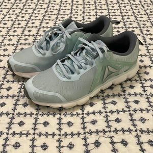 Excellent condition light blue Reebok tennis shoes. Size 8.5